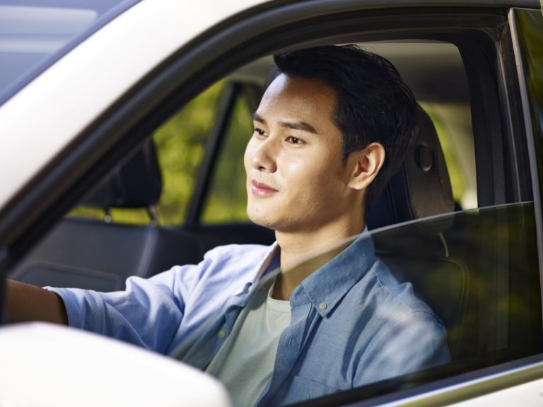 Man driving a car