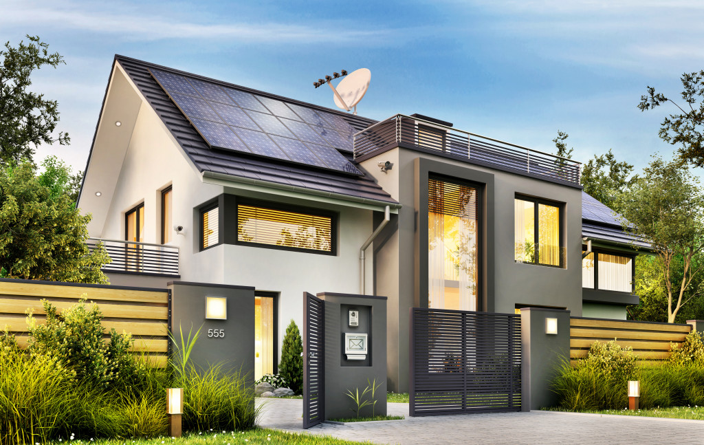 home exterior with solar panel roofing