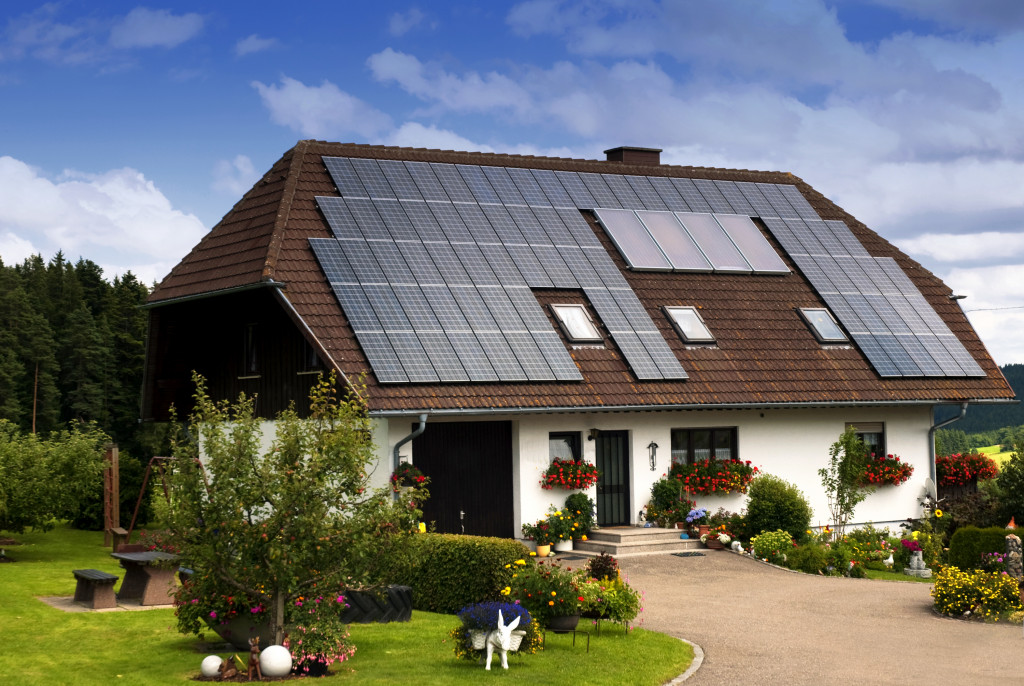 beautiful house with solar panels on the roof