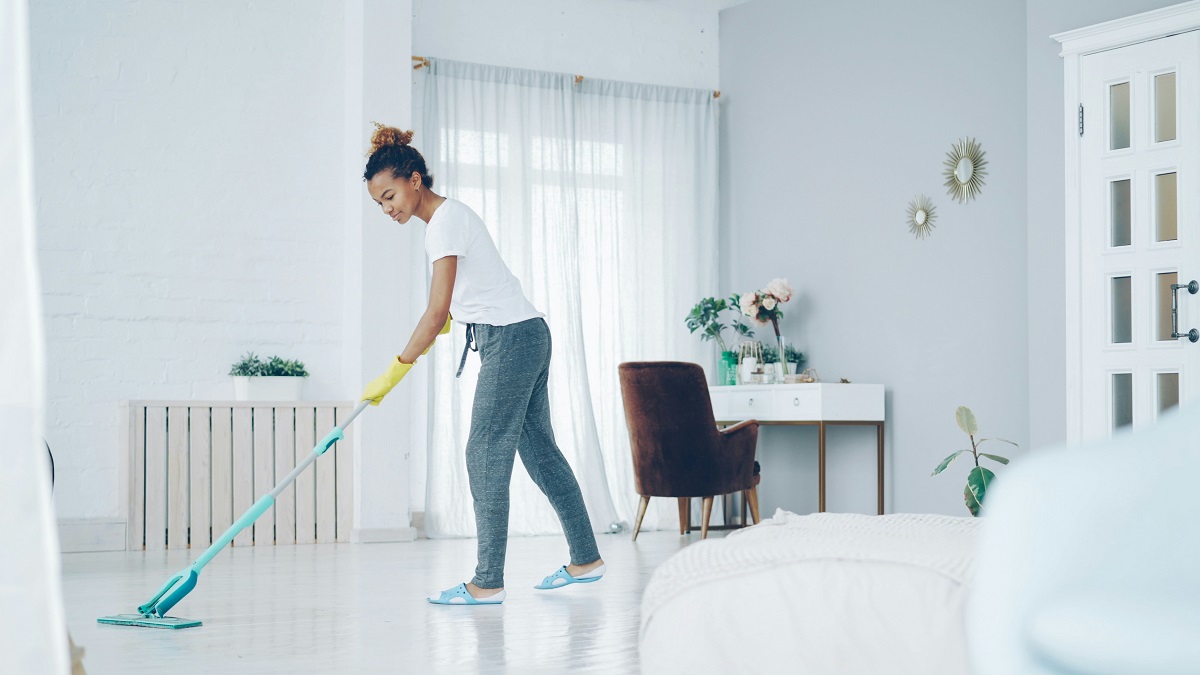 woman mopping the floor